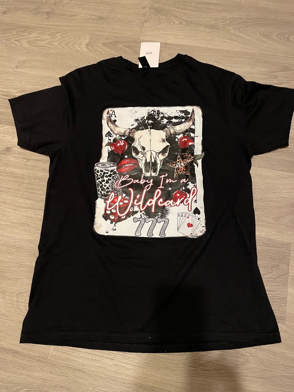 Gildan graphic tee a "Baby I'm a Wildcard" with a cow skull and poker elements